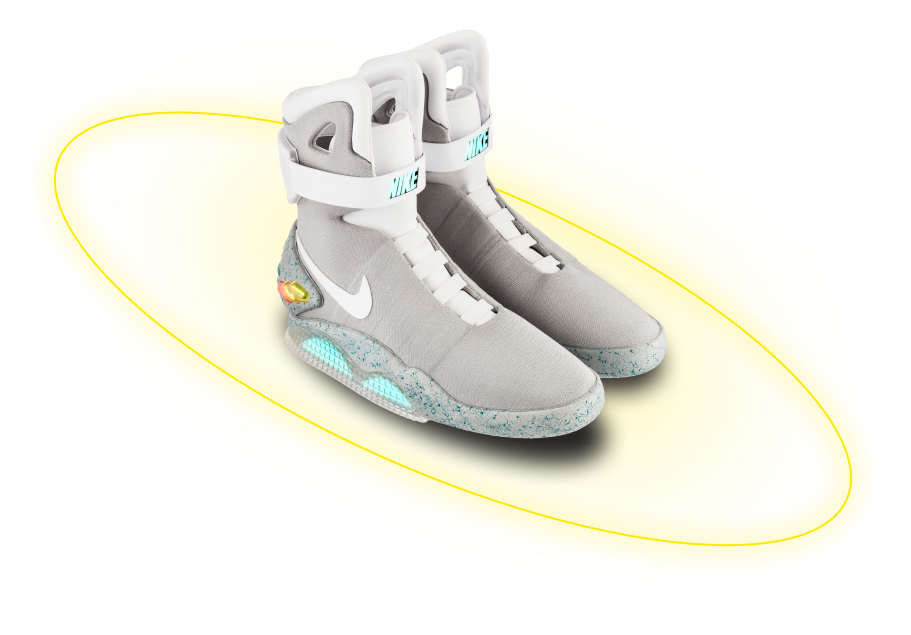 Пара кроссовок Air Mag с золотым кольцом вокруг